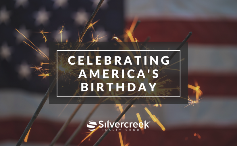 Celebrating America's Birthday Image of 4th of July American flag and sparklers.